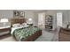 Bedroom featuring stylish décor and an ensuite bathroom with a walk-in closet at 313 Martha Ln # 4, Oldsmar, FL 34677