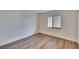 Empty bedroom featuring natural light and wood flooring at 313 Martha Ln # 4, Oldsmar, FL 34677