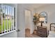 Bedroom closet with a view of outdoor area, wooden floor, and closet organizer at 313 Martha Ln # 4, Oldsmar, FL 34677