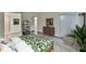 Comfortable bedroom with decorative accents and access to a private bathroom at 313 Martha Ln # 4, Oldsmar, FL 34677