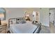Comfortable bedroom with a view into the bathroom, showcasing its calming and clean ambiance at 313 Martha Ln # 4, Oldsmar, FL 34677