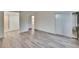 Spacious bedroom with a large window and wood flooring at 313 Martha Ln # 4, Oldsmar, FL 34677
