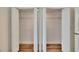 Bright closet with white doors, wire shelving, and wood-look floors offers ample storage space at 313 Martha Ln # 4, Oldsmar, FL 34677