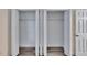 Spacious double closets with shelving, providing ample storage in the bedroom at 313 Martha Ln # 4, Oldsmar, FL 34677