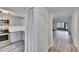 Updated kitchen featuring stainless appliances, light grey cabinets, and wood-look flooring at 313 Martha Ln # 4, Oldsmar, FL 34677