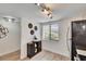 Bright kitchen with stainless steel appliances, natural light, and laminate flooring at 313 Martha Ln # 4, Oldsmar, FL 34677