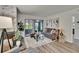 Living room with a fireplace and access to the patio at 313 Martha Ln # 4, Oldsmar, FL 34677