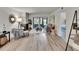 Living room with a fireplace, access to the patio, and a view to the bedroom at 313 Martha Ln # 4, Oldsmar, FL 34677