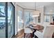 Cozy breakfast nook with wood floors, natural light and views to the water, and seating for casual dining at 3598 10Th Ne St, St Petersburg, FL 33704