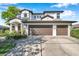 Charming two-story home featuring a three-car garage and well-manicured landscaping at 3598 10Th Ne St, St Petersburg, FL 33704