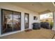 Covered patio featuring an outdoor cooking area and access to waterfront views at 3598 10Th Ne St, St Petersburg, FL 33704