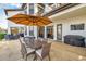 Spacious covered patio featuring dining table, seating, and outdoor cooking area at 3598 10Th Ne St, St Petersburg, FL 33704