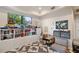 Organized playroom featuring built-in shelving, natural light, and cozy seating at 3598 10Th Ne St, St Petersburg, FL 33704