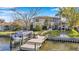 Waterfront home with private dock, boat lift, fenced yard, and patio for outdoor entertaining at 3598 10Th Ne St, St Petersburg, FL 33704