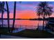 Sunset view from this waterfront property, with vibrant colors reflecting on the water at 3598 10Th Ne St, St Petersburg, FL 33704
