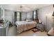 Serene bedroom with soft natural light, neutral tones, and minimalist decor for a tranquil retreat at 375 Magnolia Rd, Venice, FL 34293