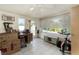 Bright sunroom with lots of natural light, tile flooring, and a relaxing area to enjoy at 375 Magnolia Rd, Venice, FL 34293