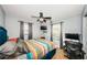 Bright bedroom featuring a TV, and office setup, with nice window views at 3850 6Th N Ave, St Petersburg, FL 33713