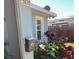 Side exterior view with a mailbox, bird feeder and flower bed at 3850 6Th N Ave, St Petersburg, FL 33713
