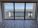 Spacious balcony overlooking a stunning waterfront view from a condo in the building at 400 Island Way # 908, Clearwater Beach, FL 33767