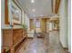 Lobby featuring tile floor, furniture, artwork and wood paneled walls at 400 Island Way # 908, Clearwater Beach, FL 33767
