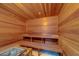 Community sauna featuring wood walls, benches and an electric heater at 400 Island Way # 908, Clearwater Beach, FL 33767