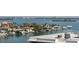 Breathtaking waterfront view showcasing the water, boats, and homes in the neighborhood at 400 Island Way # 908, Clearwater Beach, FL 33767
