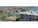Beautiful waterfront view overlooking the water, boats, and residential area at 400 Island Way # 908, Clearwater Beach, FL 33767