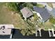 Aerial view showcasing the home's location, expansive yard, and private dock on the waterfront at 4035 N River View Ave, Tampa, FL 33607