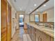 Bright bathroom with double vanity, storage, and tile floor at 4035 N River View Ave, Tampa, FL 33607