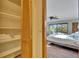 Comfortable bedroom showcasing closet, river views, and hardwood floors at 4035 N River View Ave, Tampa, FL 33607