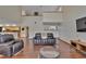 Spacious living room with an open floor plan, high ceilings, and seamless flow to the kitchen at 4035 N River View Ave, Tampa, FL 33607