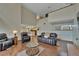Inviting living room with an open layout, comfortable seating, and seamless flow to the kitchen area at 4035 N River View Ave, Tampa, FL 33607