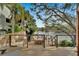 Spacious outdoor deck with a canal view, built-in grill, and comfortable seating, perfect for entertaining at 4035 N River View Ave, Tampa, FL 33607