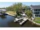 Waterfront property with private docks, lush landscaping, and stunning views, offering the ultimate in waterfront living at 4035 N River View Ave, Tampa, FL 33607