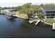 Beautiful waterfront home featuring multiple docks and outdoor spaces for enjoying the serene views at 4035 N River View Ave, Tampa, FL 33607