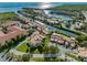 Stunning aerial view of the community with boat docks along the canal and beautiful landscaping at 4358 Outrigger Ln, Tampa, FL 33615