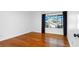 Spacious bedroom with wood floors, natural light, and large window; a bright and inviting space at 4358 Outrigger Ln, Tampa, FL 33615
