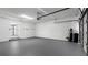 Spacious two car garage with painted walls and sealed concrete flooring at 4358 Outrigger Ln, Tampa, FL 33615