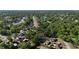 Explore a sprawling neighborhood from above, with the highlighted property nestled among lush trees at 500 Hillpine Way, Brandon, FL 33510