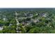 The aerial view highlights a home situated in a lush, tree-filled neighborhood, offering a tranquil and secluded atmosphere at 500 Hillpine Way, Brandon, FL 33510