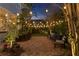 Inviting backyard patio with stylish outdoor furniture and string lights, perfect for relaxing evenings at 5024 W Homer Ave, Tampa, FL 33629