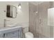 Modern bathroom featuring a walk-in glass shower, vessel sink, and elegant finishes at 5024 W Homer Ave, Tampa, FL 33629