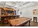 Beautiful game room with custom wet bar, coffered ceilings and pool table at 5024 W Homer Ave, Tampa, FL 33629