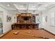 Beautiful game room with custom wet bar, coffered ceilings and pool table at 5024 W Homer Ave, Tampa, FL 33629