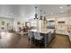Open concept kitchen, dining and living rooms at 5024 W Homer Ave, Tampa, FL 33629