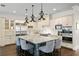 Spacious gourmet kitchen with a large granite island, stainless appliances and custom cabinetry at 5024 W Homer Ave, Tampa, FL 33629