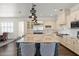 Spacious gourmet kitchen with a large granite island and stainless appliances at 5024 W Homer Ave, Tampa, FL 33629