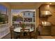 Outdoor dining area with a view of the pool and the home at 5024 W Homer Ave, Tampa, FL 33629