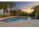 Picturesque backyard pool with a relaxing spa, perfect for enjoying tranquil sunsets at 5024 W Homer Ave, Tampa, FL 33629